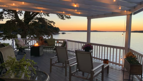 Sunset Views Vacation Cottage deck overlooking Grand Lake at sunset